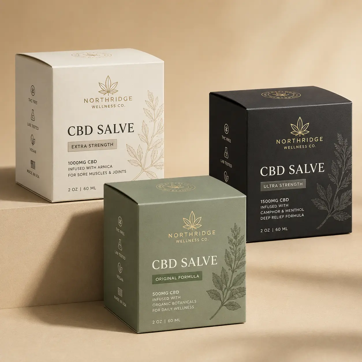 Three Northridge Wellness Co CBD salve boxes in white, green, and black displaying 500mg, 1000mg, and 1500mg strengths on beige background