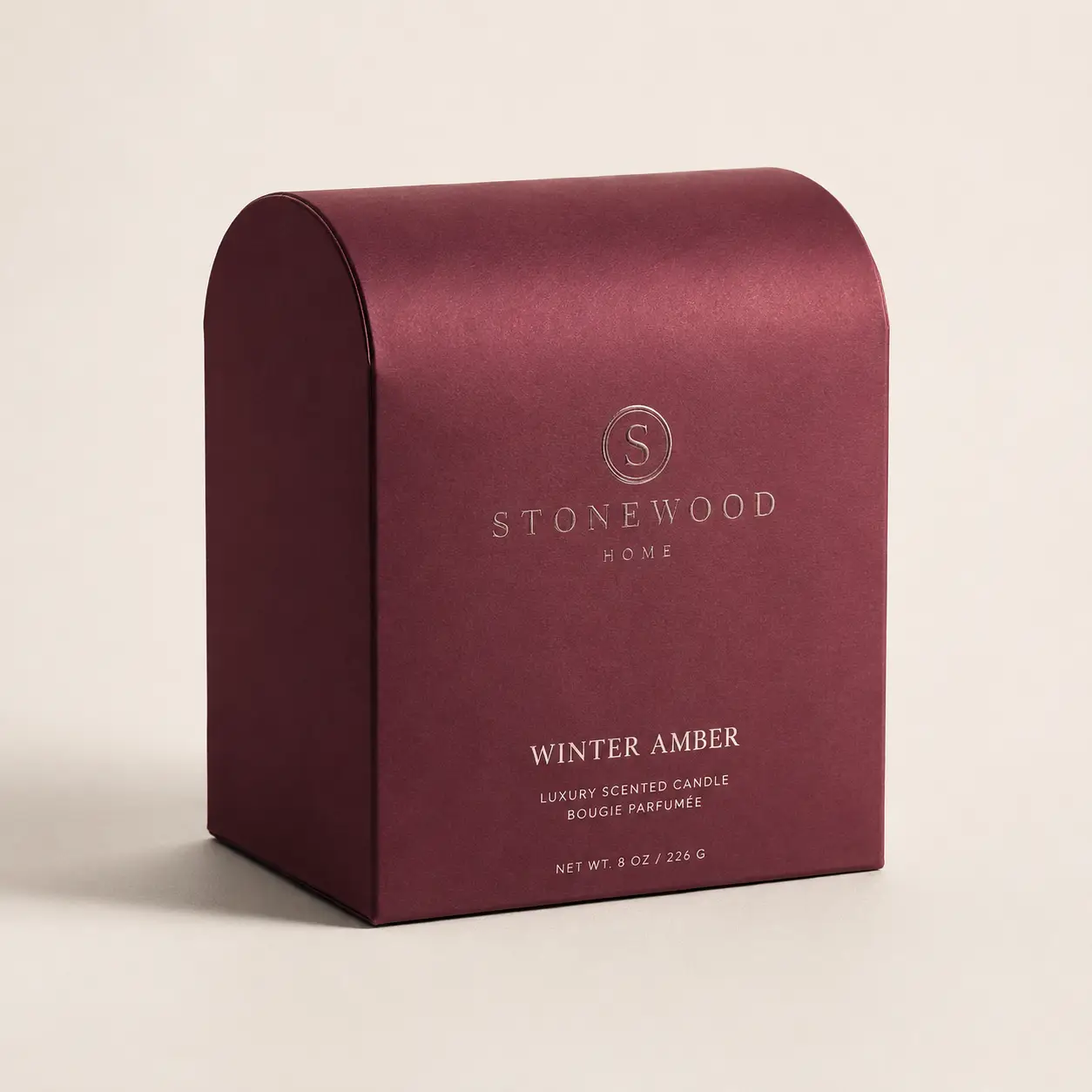 Deep burgundy arch-top luxury candle gift box by Stonewood Home, Winter Amber scent, 8oz, elegant embossed silver logo