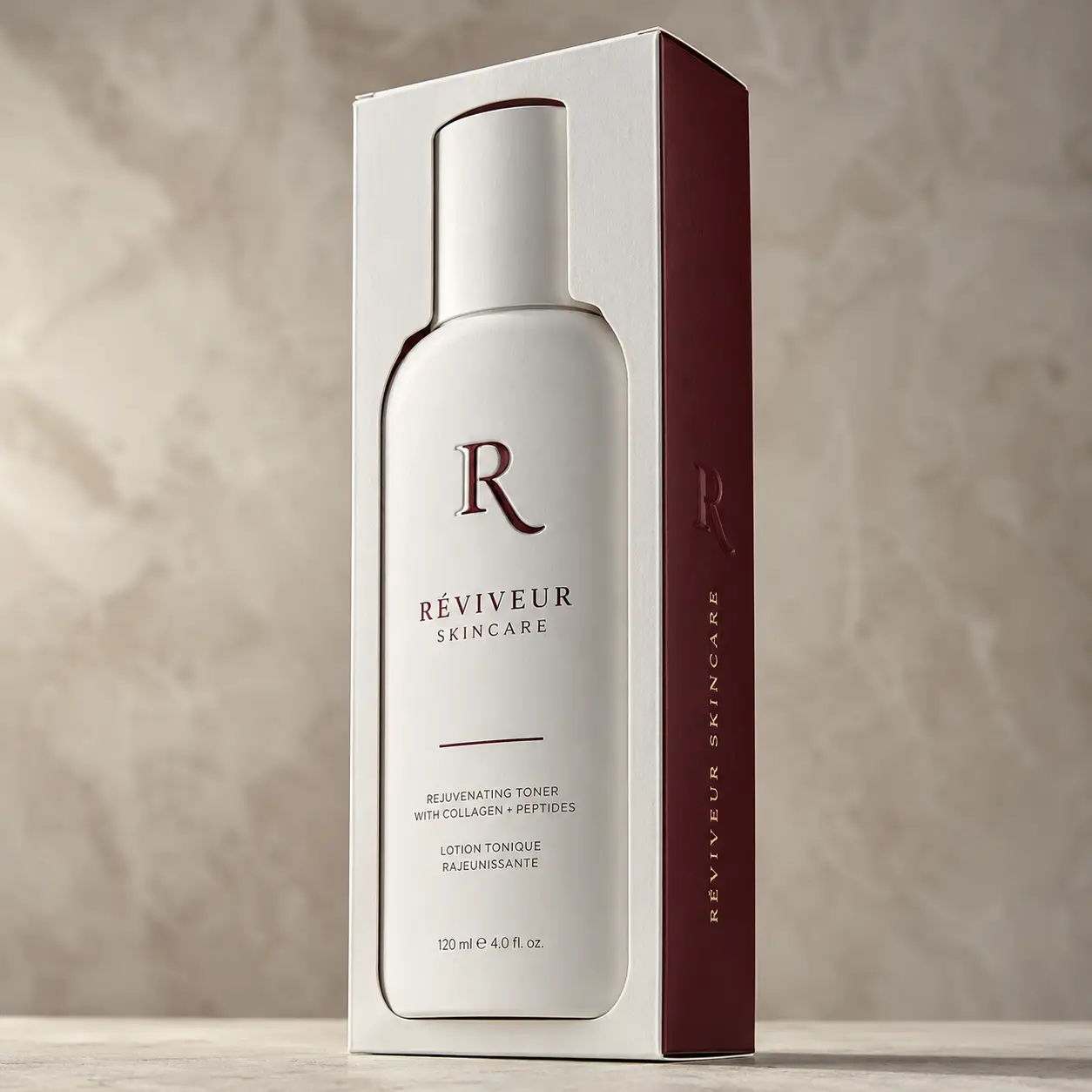 Réviveur Skincare rejuvenating toner bottle with collagen peptides in luxury white and burgundy box packaging, 120ml