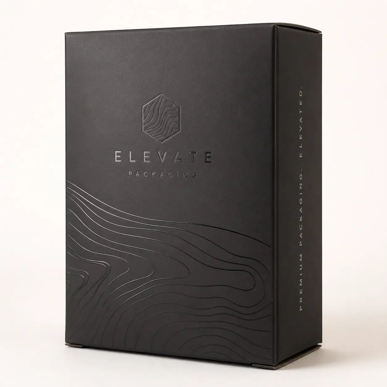 Matte black luxury rigid box with embossed topographic wave design and Elevate Packaging logo, premium custom packaging