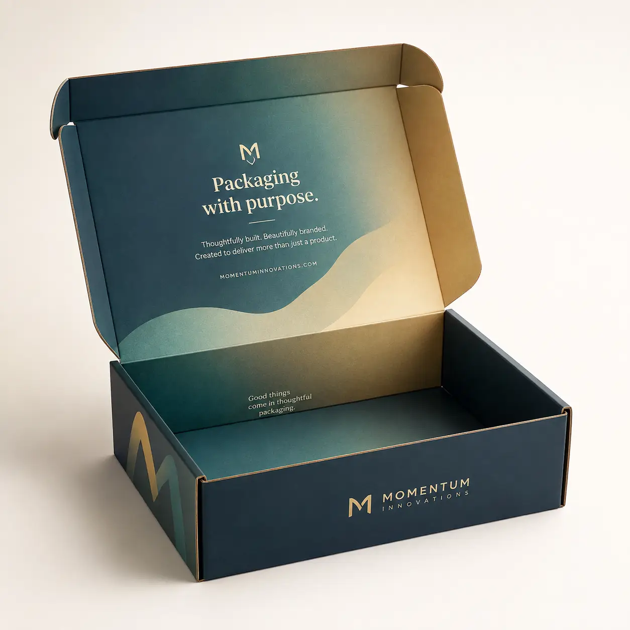 Dark teal custom mailer box open lid gold branding Momentum Innovations packaging with purpose corrugated shipping box