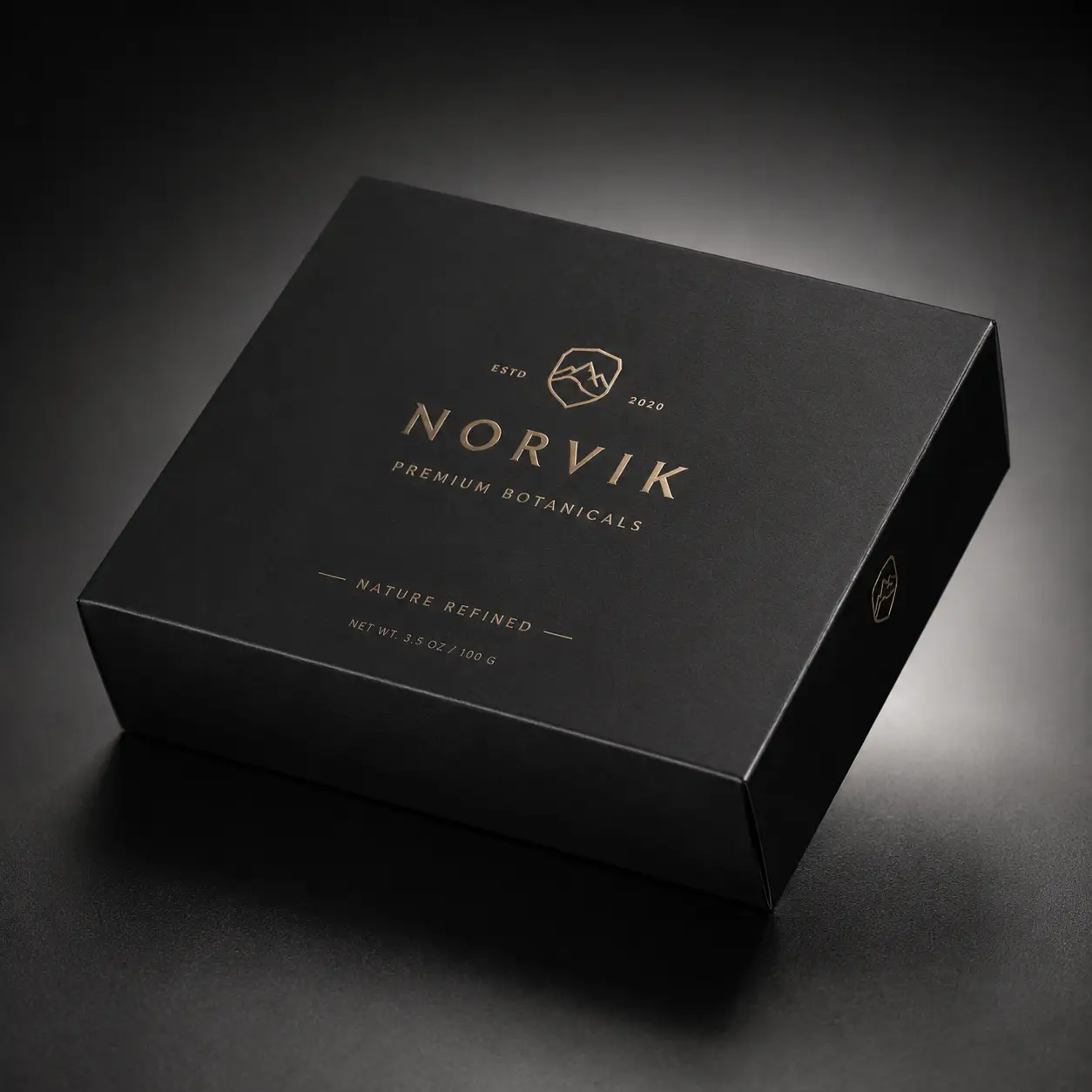 Luxury black matte gift box with gold foil Norvik Premium Botanicals branding, elegant custom packaging design, dark moody studio shot