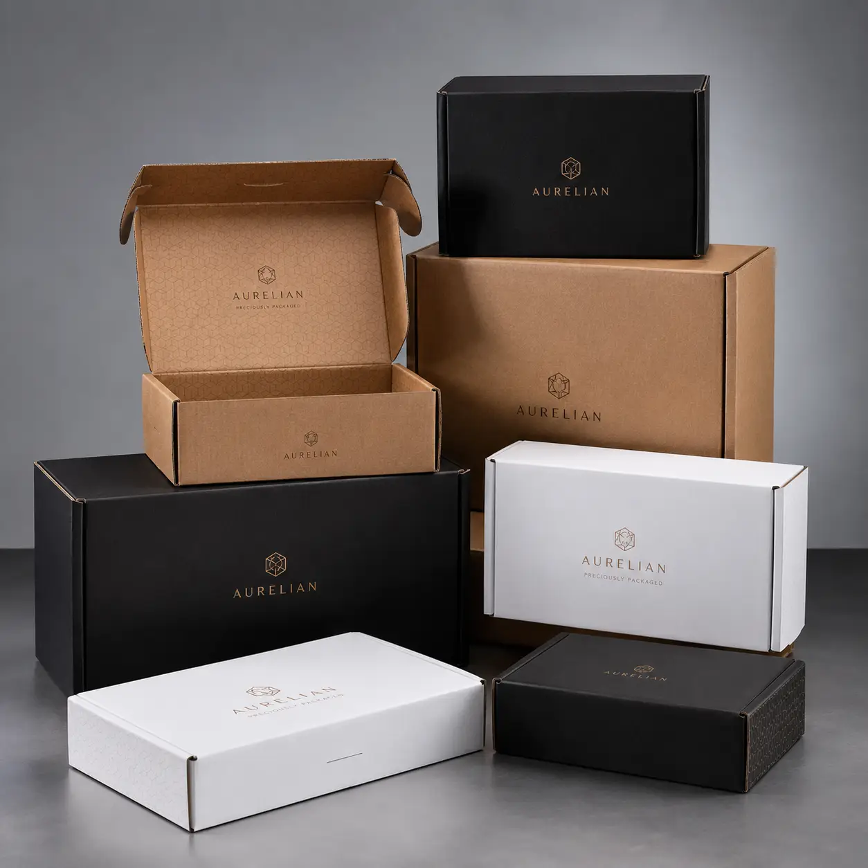 Luxury Aurelian branded mailer boxes in black, white, and kraft brown arranged elegantly for premium custom packaging display