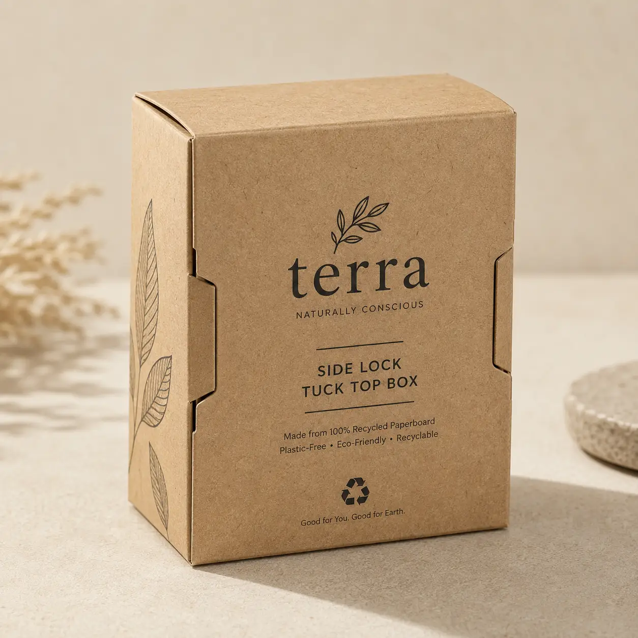 Kraft brown Terra eco-friendly side lock tuck top box made from 100% recycled paperboard on beige surface