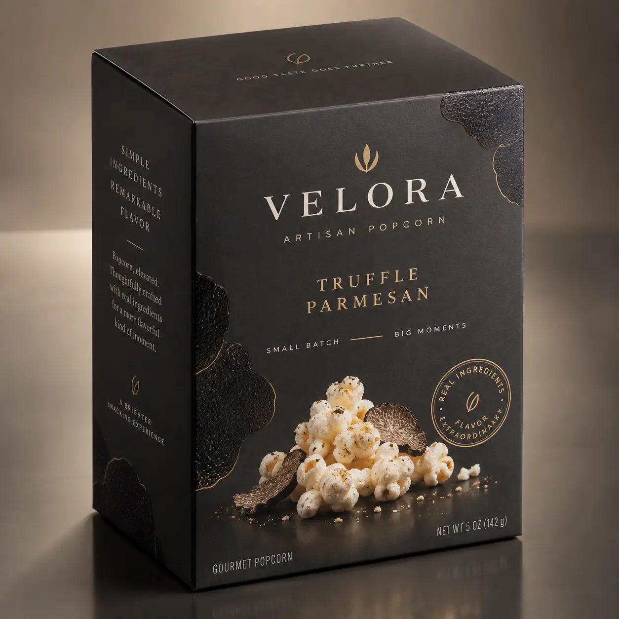 Velora Artisan Popcorn luxury black box packaging, Truffle Parmesan flavor, gold typography, gourmet snack product design