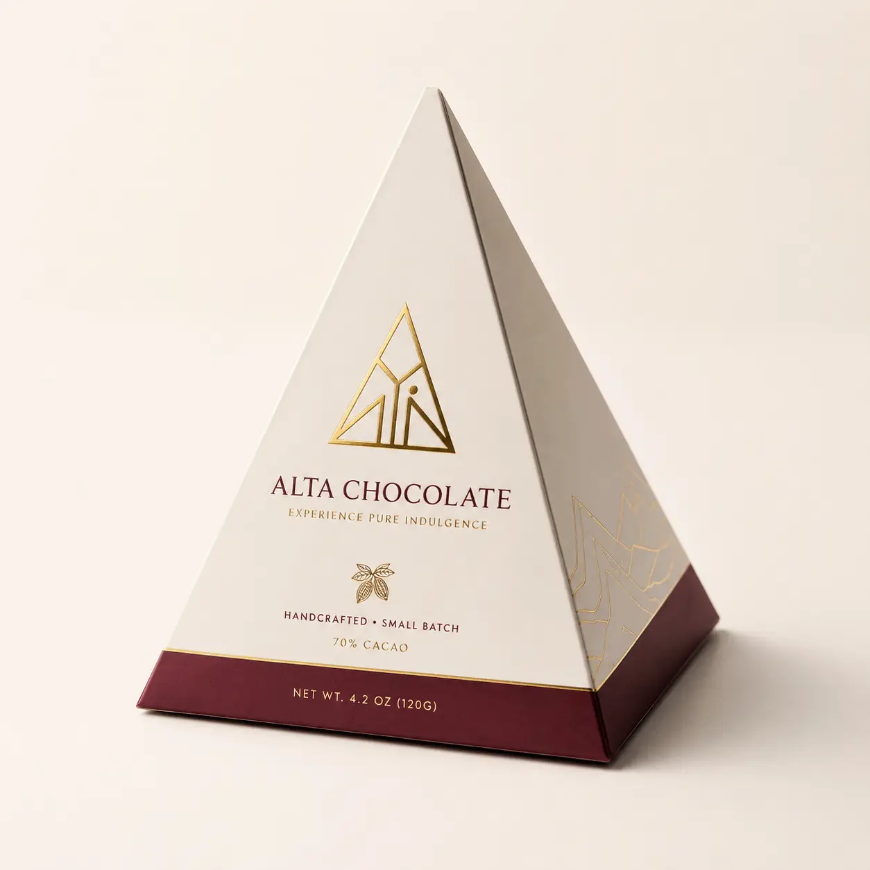 Luxury pyramid-shaped chocolate gift box, white and burgundy with gold foil Alta Chocolate branding, 70% cacao premium packaging design