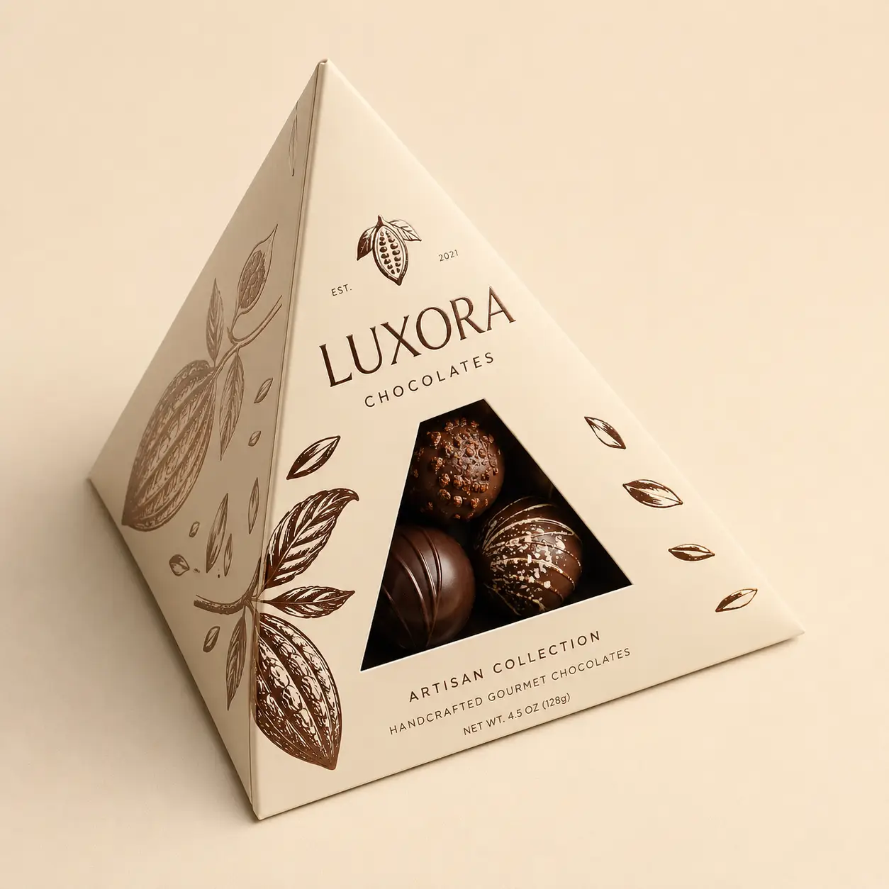 Luxora Chocolates pyramid gift box packaging with triangular window revealing dark gourmet truffles, cream luxury design, EST. 2021