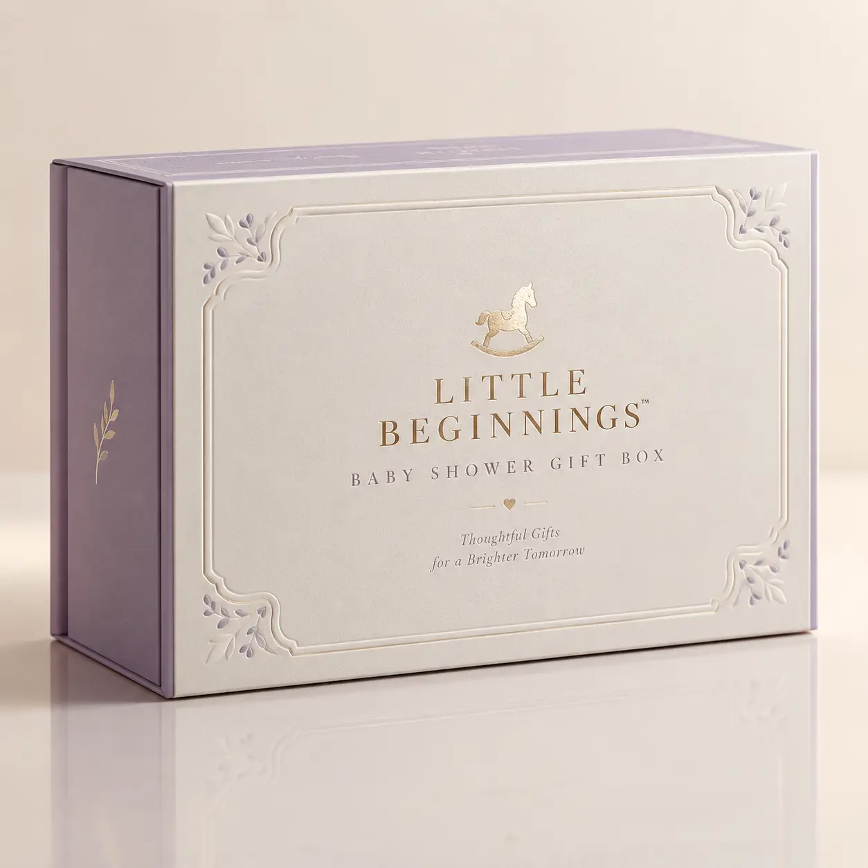 Elegant lavender baby shower gift box with gold rocking horse, Little Beginnings branding, embossed floral details, luxury packaging design