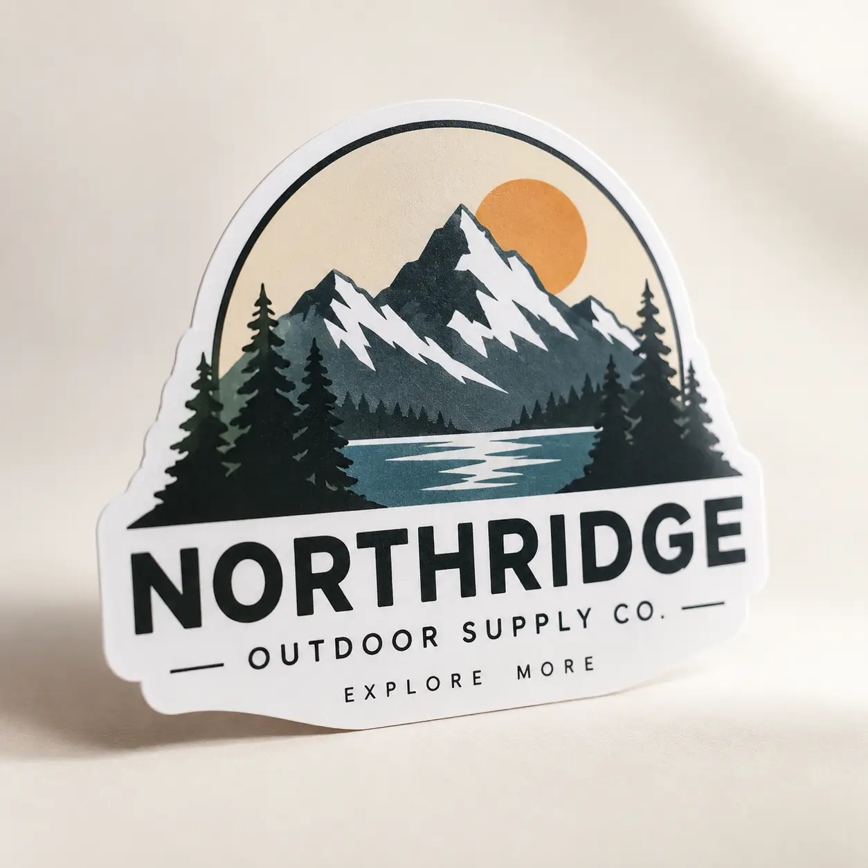Northridge Outdoor Supply Co sticker with mountain lake pine trees orange sun explore more custom die-cut label printing