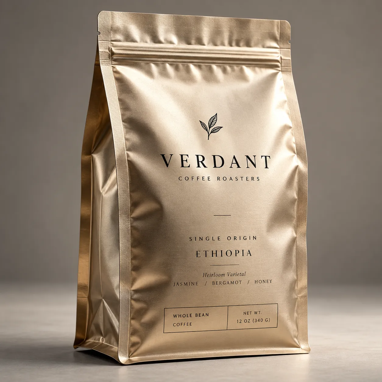 Gold metallic coffee bag packaging for Verdant Coffee Roasters single origin Ethiopia whole bean, 12oz, jasmine bergamot honey notes