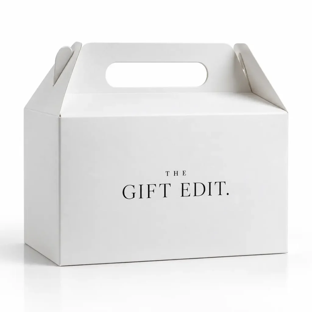 White gable gift box with handle printed with THE GIFT EDIT in elegant black serif font, premium custom packaging design