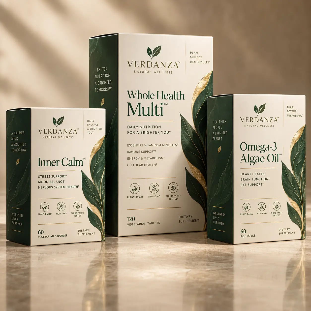 Verdanza Natural Wellness supplement packaging trio featuring Inner Calm, Whole Health Multi, and Omega-3 Algae Oil in elegant green and gold design