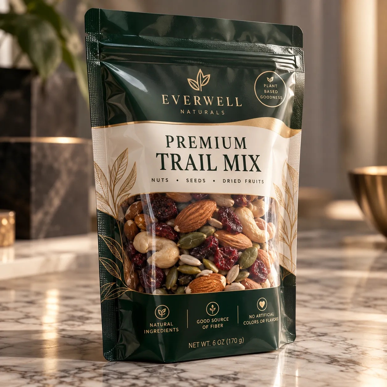 Everwell Naturals Premium Trail Mix packaging, dark green gold resealable bag with nuts seeds dried fruits on marble surface