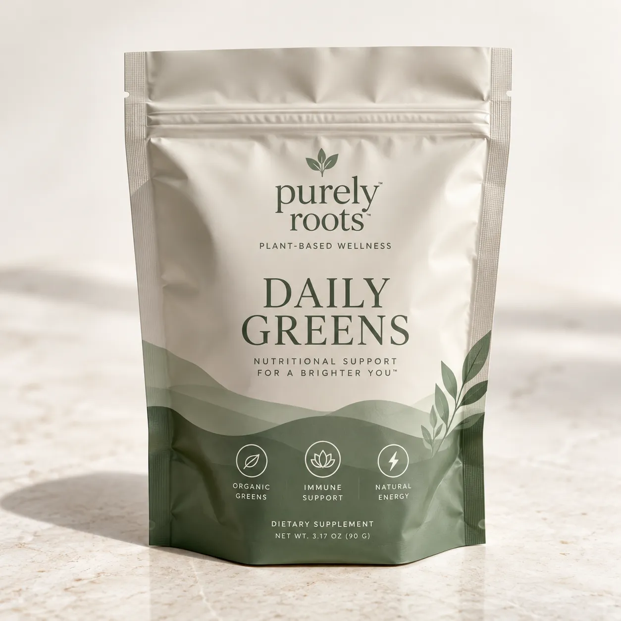 Purely Roots Daily Greens supplement pouch, sage green wave design, organic greens powder packaging, marble surface, neutral tones